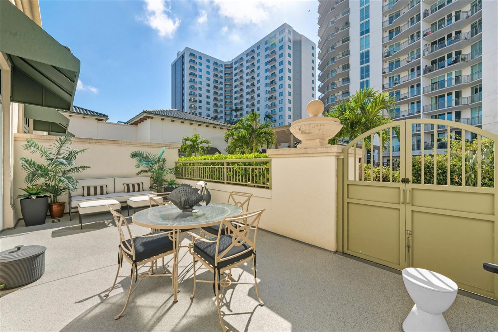 Step inside and experience the essence of refined Harbour Island living in this casita style two story residence. Sunlight pours through soaring ceilings, filling each space with warmth and airiness. Two private balconies and a secluded patio blur the line between indoors and out, creating an elevated lifestyle that feels both effortless and serene. Every detail has been thoughtfully customized, from the open staircase with its sleek modern railing to the porcelain accent wall that anchors the living room with quiet elegance. The phrase that comes to mind when you experience this casita is “convenience by design.” Residents enjoy the ease of responsive concierge services, rentable guest suites for family and friends, and the rare privilege of on-site valet. This residence also offers two assigned parking spaces just steps from your door with no elevator required. Every element has been carefully curated to simplify daily living while maintaining an atmosphere of sophistication. Amenities of the building extend the lifestyle even further with a resort style pool and lounging deck, a fully equipped fitness center, private event and party space, and professional conference rooms. Together, these offerings create a setting where wellness, productivity, and leisure are all within easy reach. And then, there is the location. Just steps away, the best of downtown Tampa comes alive with fine dining, chic shops, and the vibrant energy of the city. Evenings can be spent strolling to Amalie Arena for Lightning games or catching world class concerts, all just beyond your doorstep. This is more than a home, it is a story of elegance and ease woven seamlessly together where thoughtful design meets the pulse of Tampa’s most coveted lifestyle.