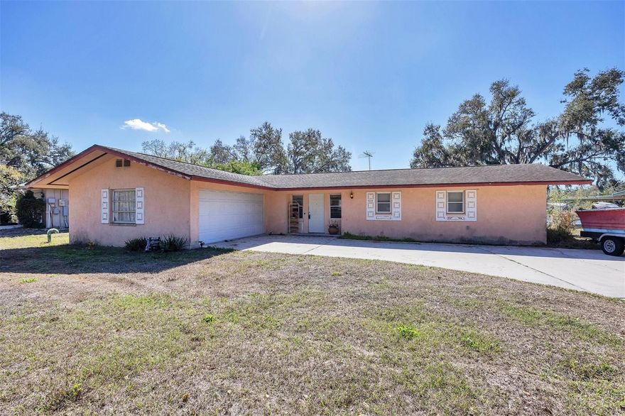 Custom Built -Great starter home with Water Views in DeSota Lakes community located in highly desirable Sarasota FL. Expansive water views from Living Room - Kitchen- Dining and both bedrooms. Sliding glass doors lead out to the covered patio with a large backyard. Wood burning fireplace will take the nip out of the air on that rare occasion. Plenty of parking for your boat/RV. This home has a lot of potential to make your very own. NO HOA or CDD fees here.