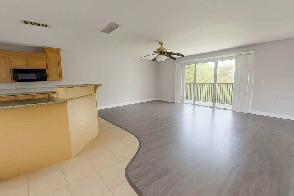 Photo of 200 Country Club Dr #1302, Largo, FL 33771 (MLS # TB8443656)