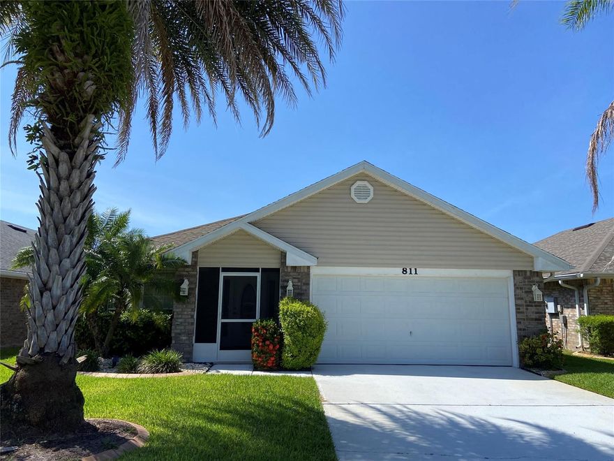 This Beautiful 4 bedroom 2 bath lake front home is located in desirable Coral Trace a Gated community. This home has a spacious open kitchen, split floor plan, master bedroom with a large walk in closet, fireplace in the living room area, in home laundry room, vaulted ceilings and a screened in porch to enjoy morning coffee and relaxing evenings overlooking the lake.  Located right off of I95, close to shopping and the beach.  The Community has a club house, pool, and work out room.  Lawn maintenance is included. This won't last long!