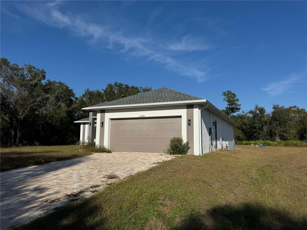 Photo of 23356 Rosewood Avenue, Punta Gorda, FL 33980 (MLS # O6378171)