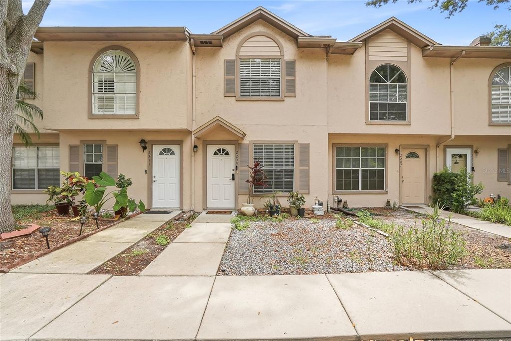 Photo of 2209 Fletchers Point Circle, Tampa, FL 33613 (MLS # TB8518954)