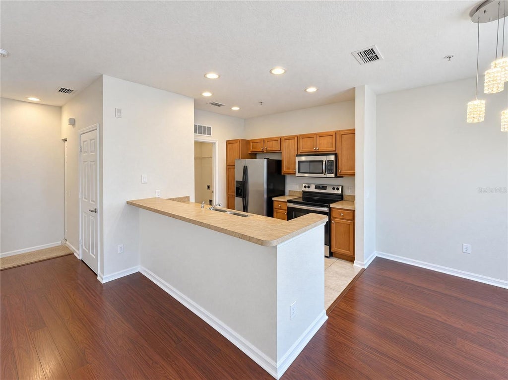 Photo of 2334 Grand Central Parkway #9, Orlando, FL 32839 (MLS # O6452194)