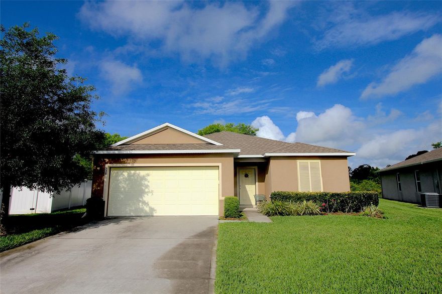 This beautiful 4 bedroom, 2 bath home in Edgewater Lakes is barely 5 yrs-old backing to preserve and private water views! Inside is an open & spacious floorplan with formal living room, dining room & family room. Built in 2016 you'll find yourself surrounded by everything fresh & like new. The kitchen features huge island breakfast bar, dark wood cabinets with black appliances and decorative tile backsplash. The spacious master bedroom offers walk-in closet and nice sized bathroom with dual sinks. The second and third bedrooms share a bathroom plus a 4th. bedroom or office. Other outstanding features include inside laundry with newer washer and dryer. The back yard is great for relaxing or entertaining with Florida room plus fenced yard backing to the preserve.Hurry before this gem is gone ;Water: City