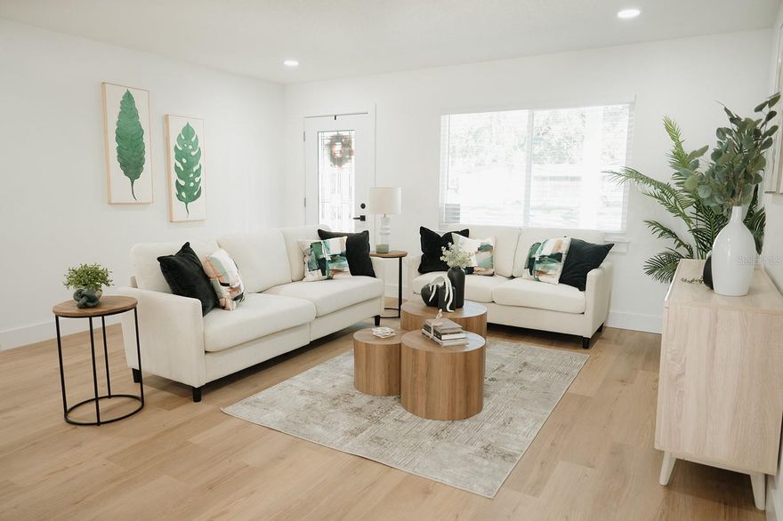 Step into this stunning, fully renovated home where every detail has been carefully crafted for modern living and effortless comfort.
This impressive 4-bedroom, 3-bathroom residence has been beautifully expanded with nearly 1,000 SqFt of brand-new living space, offering the perfect blend of style, functionality, and quality craftsmanship throughout.  The heart of the home is a brand-new kitchen featuring elegant quartz countertops, custom cabinetry, and a butler’s pantry — a hidden gem designed to keep your coffee bar, microwave, and favorite gadgets neatly tucked away.  Every detail has been renewed: new bathrooms, luxury flooring, a new HVAC system, new septic tank, and new well, ensuring peace of mind and long-term value. The open-concept layout fills the home with natural light and creates a warm, inviting atmosphere — perfect for family gatherings and entertaining.  Step outside to a spacious backyard with plenty of room for a future pool, surrounded by a peaceful conservation area. With no rear neighbors, you’ll enjoy total privacy and the serenity of nature every day.
Move-in ready, this home truly combines modern luxury, space, and tranquility — a hidden gem you don’t want to miss!  This is Peace of mind.