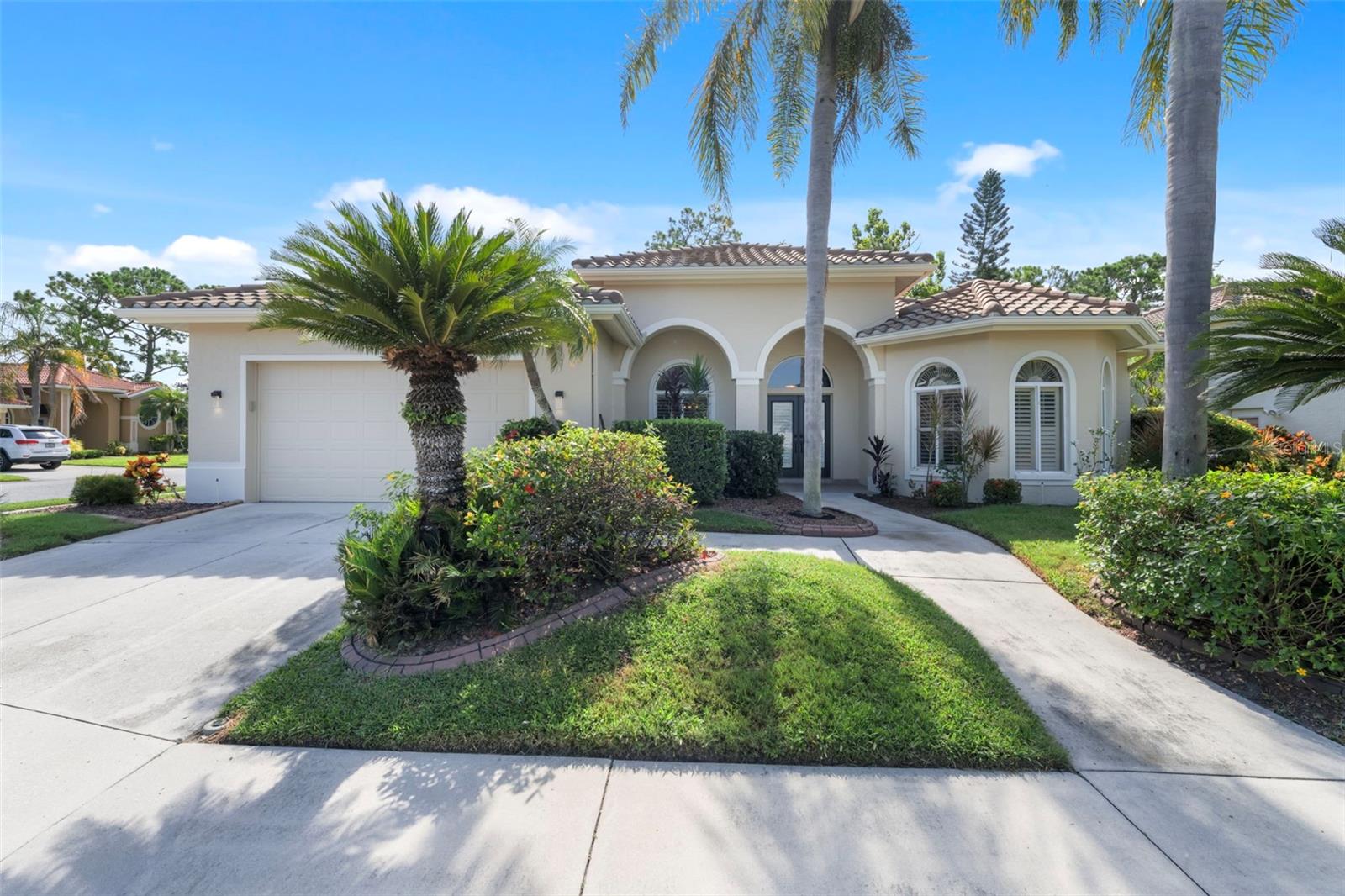 Well-Maintained Pool Home with Recent Upgrades in Huntington Pointe. Set on a large corner lot in the sought-after Palmer Ranch community, this 3-bedroom, 2.5-bath + den/office home offers over 2,700 sq. ft. of comfortable living. While the interior maintains its original charm, the home boasts many recent upgrades including all new kitchen appliances (2023) — induction cooktop, wall oven, dishwasher, refrigerator, disposal — plus new faucets, upgraded door hardware, freshly painted bedrooms and office, comfort-height toilets, and a new washer and dryer. The bright kitchen with central island and breakfast nook overlooks the sparkling saltwater pool and screened lanai. Outdoors, the entire exterior of the home — including the pool cage with new screening — has been freshly painted. Additional updates include a refinished garage floor, new pool pump (2024), rebuilt well system (2025), and refreshed landscaping. Enjoy multiple living spaces, a cozy fireplace, and a primary suite with double walk-in closets and a spa-like bath. Roof (2019) and hot water heater (2021) add peace of mind. Furnishings are negotiable.Minutes to Legacy Trail, Siesta Key Beach, shopping, dining, and more — this home is ready for your personal touch.