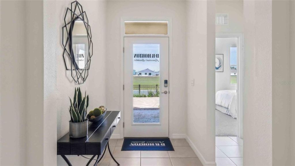 Photo of 8209 Ives Place, Wildwood, FL 34785 (MLS # OM714175)