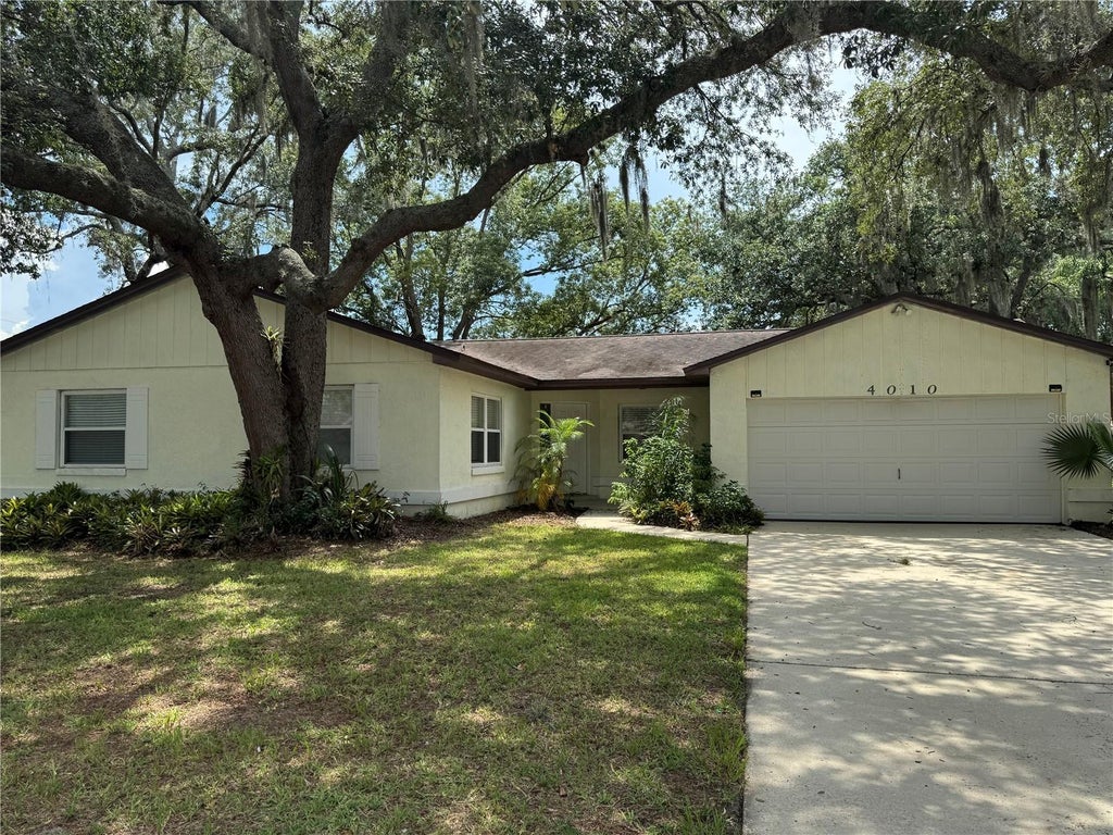 Photo of 4010 Woodsong Drive, Orlando, FL 32817 (MLS # O6420804)