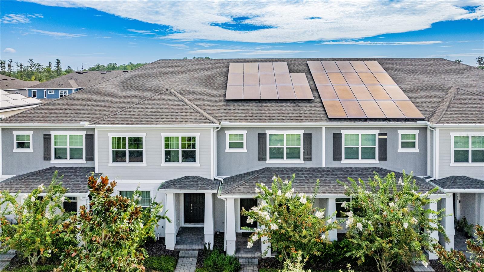 Make this energy-efficient townhome in a prime Winter Garden location YOURS! This 3-bedroom, 2.5-bath home offers 1,868 sqft of modern living with a 2-car garage, a private paver patio, and an open-concept layout featuring granite countertops, stainless steel appliances and a spacious kitchen island. The large primary bedroom includes an en-suite bathroom with dual sinks and a walk-in closet. Two additional bedrooms provide generous space, plus a laundry area with washer and dryer for added convenience. Solar panels (to be paid off by the seller at closing) and an electric vehicle charger are included! Furniture is not included. Zoned for top-rated A-rated schools and located just minutes from Hamlin’s shops, restaurants, movie theater, and Disney’s Flamingo Crossings. Discover why this should be your next home, schedule your showing today!
