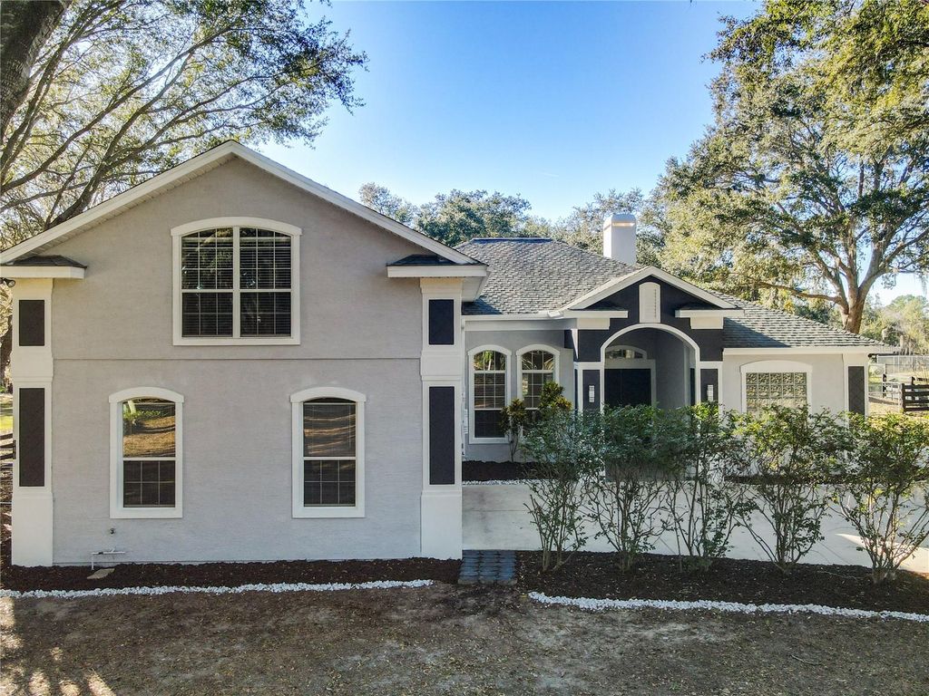 Photo of 949 Hawk Landing, Fruitland Park, FL 34731 (MLS # TB8522307)