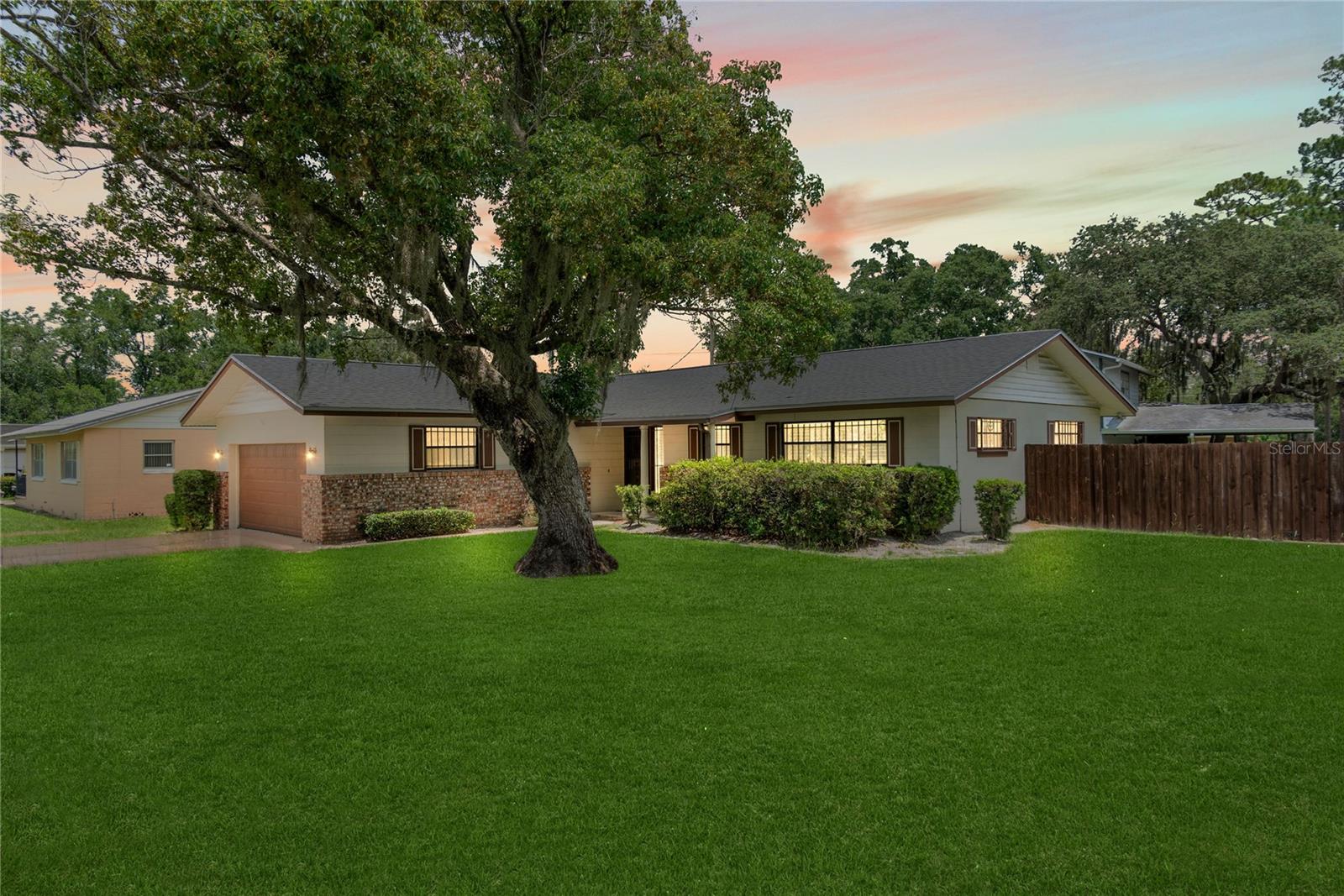 One or more photo(s) has been virtually staged. Welcome to a beautifully renovated home in a highly sought-after Idyllwilde neighborhood! The interior of the home was recently updated from top to bottom.
As you enter you will notice an open floor plan with a large living space. Freshly updated with brand new tile floors and plantation shutters throughout the home. This property is in immaculate condition with upgrades that include new knockdown ceilings, lighting and ceiling fans. NEW ROOF IN 2020!
The kitchen comes equipped with a new water filtration system, new stainless steel appliances, sleek granite countertops and new cabinets. It also includes a large breakfast bar that’s perfect for casual dining or entertaining.
The master bedroom is situated at the rear of the home with its own private bathroom.
Guests can enjoy the convenience with two secondary bedrooms sharing a hall bath.
Step outside to the screened-in lanai, where you can enjoy your morning coffee or evening relaxation.
This home also includes a fully fenced-in backyard, ready for entertaining guests! Did I forget to mention there is no HOA! Just minutes away from 417, shopping, dining, and entertainment options. Excellent local schools and healthcare facilities ensure that all your needs are within reach.