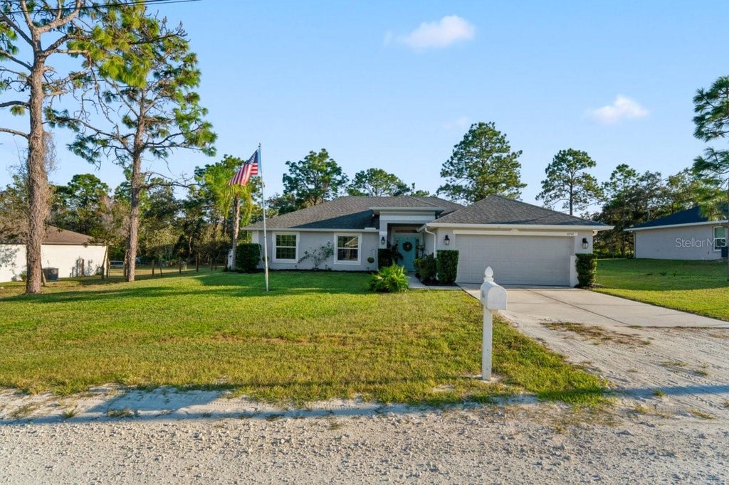 Photo of 11352 Mississippi Kite Avenue, Weeki Wachee, FL 34614 (MLS # TB8554491)