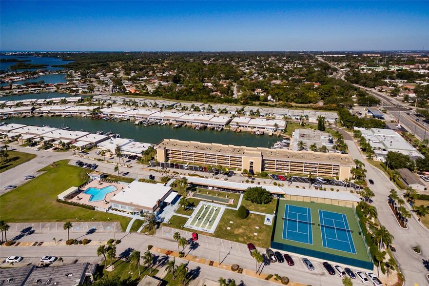 Welcome to Boca Ciega Point, where this waterfront community is entering an exciting new chapter with beautifully renewed amenities and grounds.  Ideally positioned on the second floor, this residence offers elevated peace of mind and relaxed coastal living. This 2B/2B has as a full open water view . There are thoughtful custom touches in every room.  Being minutes away, Madeira Beach is also experiencing a vibrant renewal of it own - making this the perfect moment to enjoy one of Floridas most beloved coastal destinations.  This is a home that simply must be seen to be fully appreciated. This property offers an active lifestyle with Pickle Ball, Tennis, Full Gym, estensive library.  Social gaathering too numerous to list