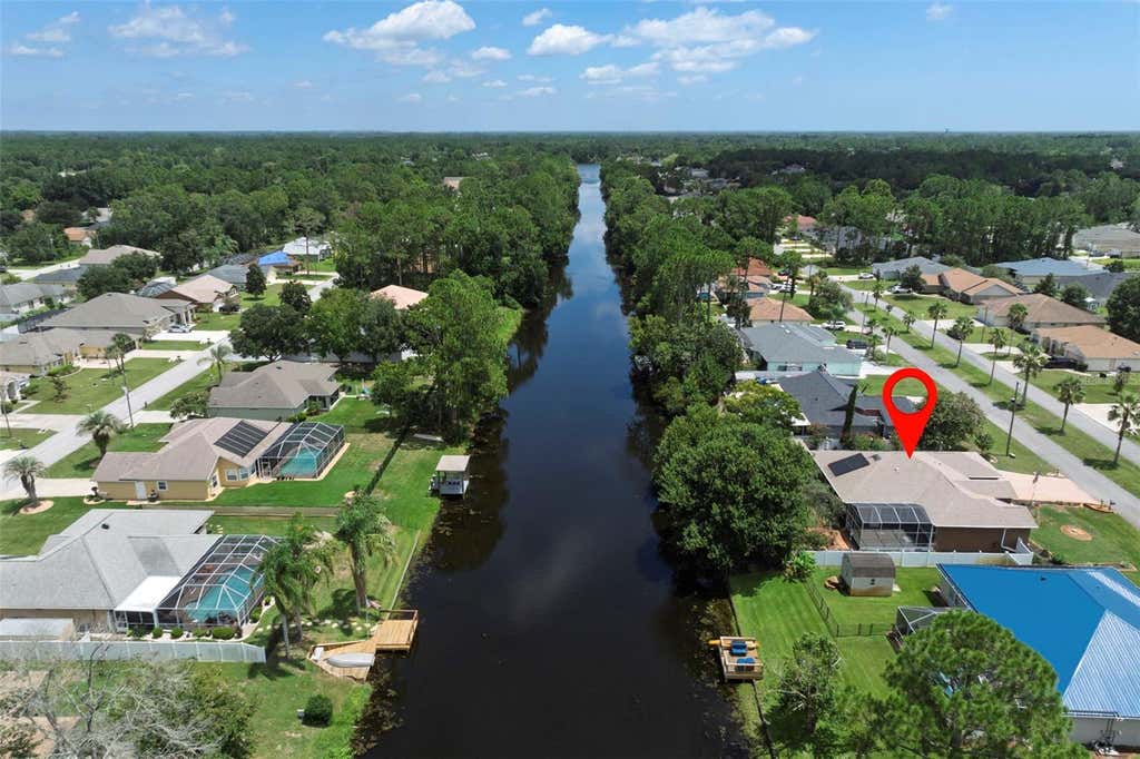 Photo of 52 Buttonworth Drive, Palm Coast, FL 32137 (MLS # FC320454)