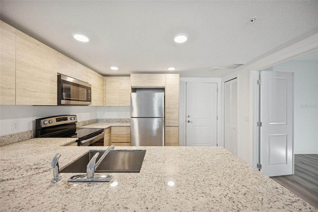 Photo of 1210 Southstation Place #209, Orlando, FL 32809 (MLS # O6366440)