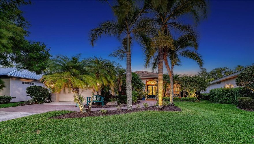 Tucked along a quiet cul-de-sac in the Lakeside section of Laurel Oak Estates, this residence is defined by its peaceful setting highlighted by beautiful lake and golf course views that unfold beyond the backyard. From the moment you step inside, the home draws your attention outward—framing the pool, lush landscaping, water, and fairway in a way that feels both open and inviting.
Offering more than 2,400 square feet of living space, the three-bedroom layout is designed for comfortable everyday living with an easy flow between spaces. High ceilings, crown molding, and a thoughtful floorplan create a sense of volume, while the main living areas connect seamlessly for both casual living and entertaining. 
The kitchen serves as a natural gathering point, featuring solid wood cabinetry, built-in elements, a center island, and a casual dining area that opens to the great room. Large windows and sliding glass doors bring in natural light and maintain a constant connection to the outdoor setting.
The primary suite offers a private retreat with an en-suite bath, dual vanities, and a walk-in closet. Two additional bedrooms, one bedroom is currently utilized as a flexible office or den, provide space for guests or work-from-home needs. A series of thoughtful updates—including a newer A/C system, hot water tank, plantation shutters, and refreshed interior finishes—enhance the home’s overall appeal. 
Outdoor living is where this property truly stands out. The screened lanai opens to a beautifully landscaped setting with a heated pool, layered lighting, and a striking outdoor fireplace that creates a natural gathering space in the evenings. Beyond, the lake and golf course provide a wide, tranquil backdrop.
Located within the guard-gated community of Laurel Oak Estates Lakeside, residents enjoy a maintenance-free lifestyle for added peace of mind and optional membership to Laurel Oak Country Club, offering two championship golf courses, tennis, fitness, dining, and an active social calendar. 
Conveniently positioned near I-75, the home is just a short drive from Waterside Place, UTC’s shopping and dining district, downtown Sarasota’s cultural amenities, and the Gulf beaches—bringing together privacy, accessibility, and the best of Sarasota living.