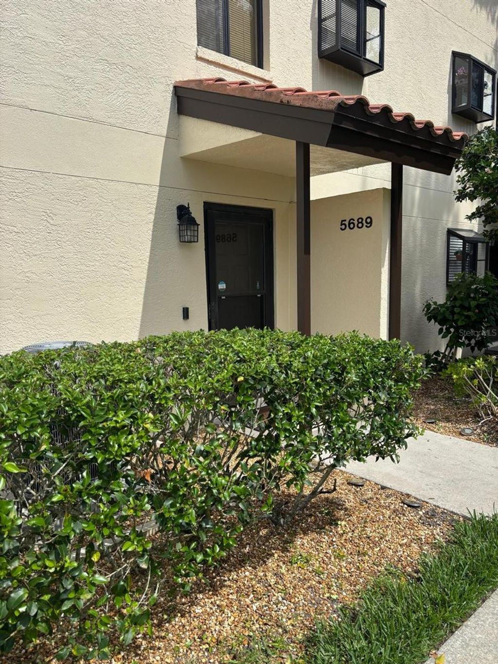 Photo of 5689 Gardens Drive, Sarasota, FL 34243 (MLS # A4658140)