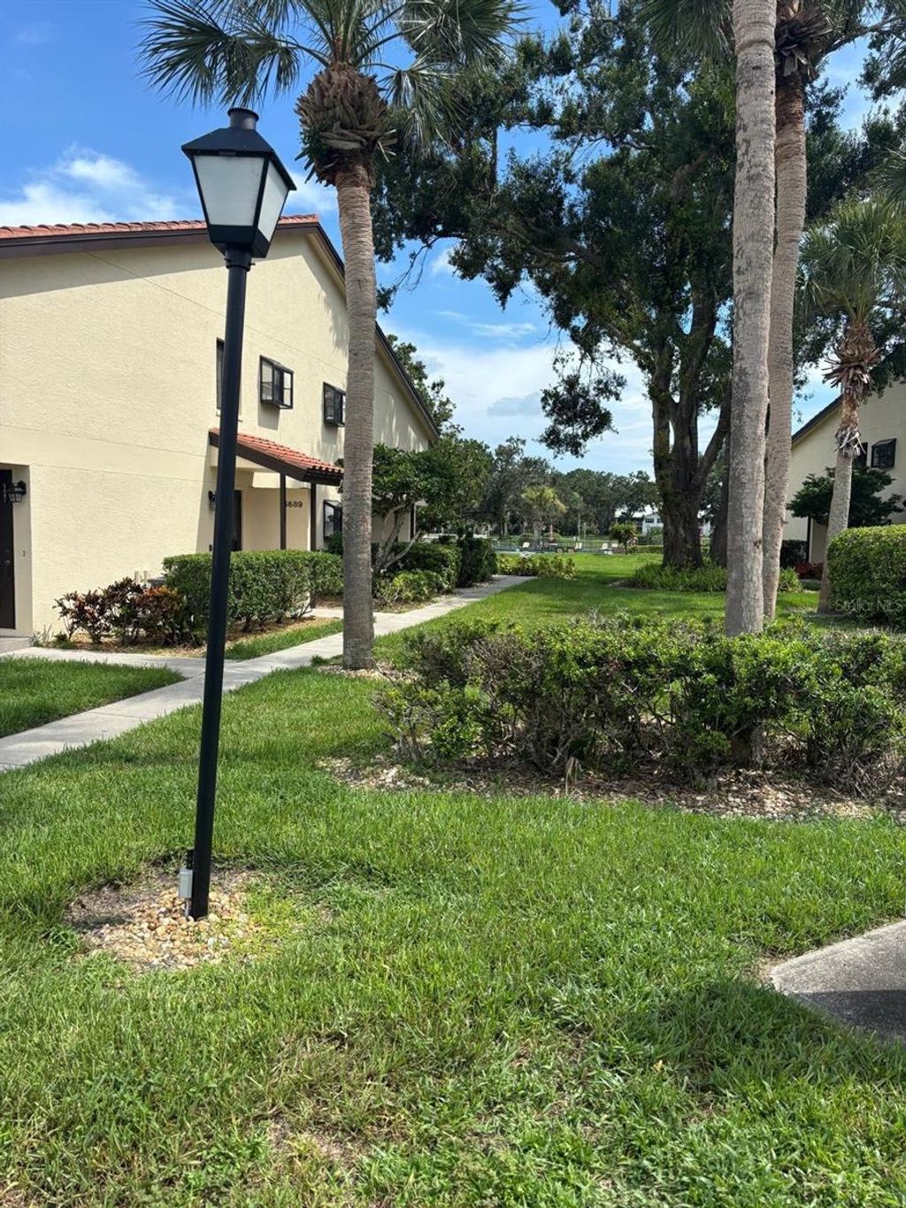 Photo of 5689 Gardens Drive, Sarasota, FL 34243 (MLS # A4658140)