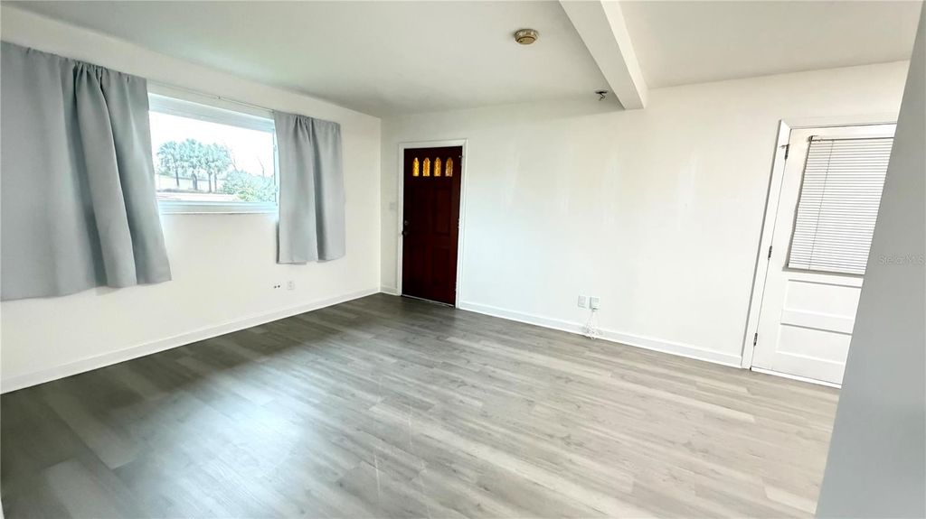 Photo of 6310 Lake Underhill Road #A, Orlando, FL 32807 (MLS # S5139989)