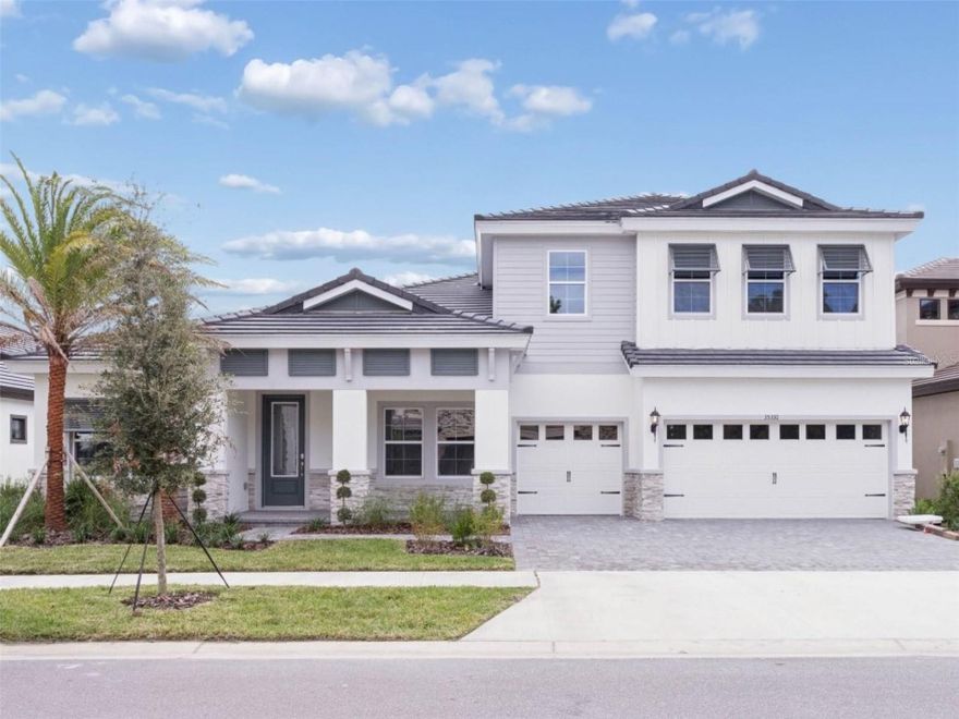 One or more photo(s) has been virtually staged. Key West II - 
This Key West II is Ready Now! This two story, 5 bedroom home offers a wonderful open floorplan encompassing a den office accessed from the foyer and a bonus room accessed from the grand room. Imagine settling into this beautiful home where the open concept is perfect for everyday living and entertaining. Just as you enter, the dedicated den or home office provides a quiet retreat, while the main area flows seamlessly into the combination grand room, a stunning island kitchen, and a casual dining area, creating a natural gathering spot. The main floor is designed for ultimate convenience, featuring two secondary bedrooms and a spacious, private owner’s retreat. The kitchen is a true centerpiece with sleek Quartz countertops and an upgraded gourmet appliance package that makes cooking a delight. Outside, you'll love relaxing on the covered lanai while enjoying the peaceful, stunning wetland views. The upper level offers even more flexible space with an expansive second bonus room and two additional secondary bedrooms, both complete with large walk in closets. This Key West II is more than a house; it’s the perfect, move in ready backdrop for your best life. Listing Price amount for this Pending Sale includes Design and Structural Options.