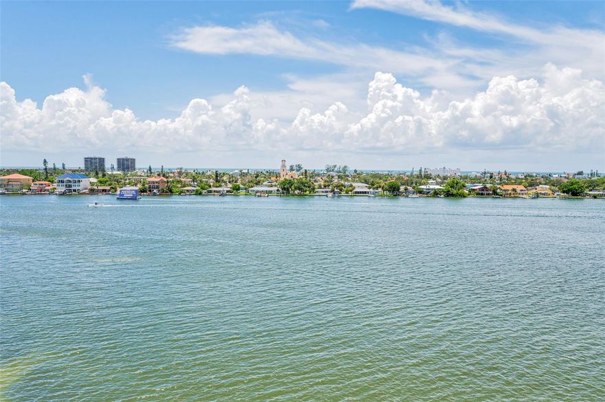 Beachwalker at Harbourside. Stunning panoramic Intracoastal and Gulf views from this two bedroom two bath sixth floor unit. Open floor plan with 1,145sf. of living area and high ceilings throughout. Balcony off living area and primary bedroom offering gorgeous water views and year round Sunsets. Updated kitchen with loads of cabinet space and Corian counter tops. Both bathrooms updated in 2017. Other features include: Top of the line hurricane impact windows and sliders 2017, Hurricane shutters, New A/C system 2018, Hot water heater 2023, Refrigerator 2023, inside Washer and dryer 2023, under building parking, interior recently painted and so much more. Harbourside community is gated with 24 hour security, a 1.6 mile waterfront walking trail, marina with boat slips, kayak racks, multiple heated pools, heated spa, men and women’s gyms, tennis courts, pickle ball courts, shuffleboard, gas grills, car washing station with free vac & air, and a recently renovated clubhouse with endless activities along with a library, a billiards room, a work shop and more. This South Pasadena location is a short stroll to the beautiful Gulf Beaches, Interstate 275, and vibrant downtown St. Pete. Harbourside is one of the very nicest and well built communities in all of Pinellas County. Be sure to view the beautiful virtual tour.