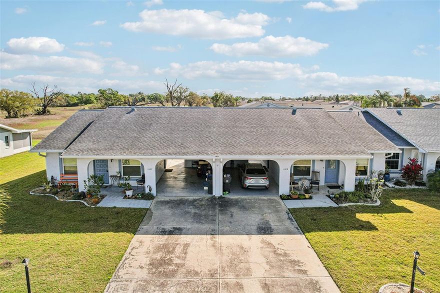 One or more photo(s) has been virtually staged. Welcome to the vibrant 55+ lifestyle of Sun City Center! This beautifully maintained 2-bedroom, 2-bathroom condo offers a rare combination of modern style and outdoor convenience, featuring a private driveway and a covered lanai for dedicated parking. As you step inside, you’re greeted by elegant dark wood laminate flooring and an open-concept living area bathed in natural light from large glass sliders that showcase peaceful backyard views. The kitchen is a standout, boasting contemporary stainless steel cabinets and an abundance of storage for the home chef.
The primary suite serves as a true retreat with a spacious closet and an en suite bathroom featuring a standalone shower. Your guests will feel equally at home in the second bedroom, which offers private access to the back patio through its own set of sliding doors. This outdoor oasis is designed for relaxation, complete with a privacy partition and a "roof mate" to ensure a secluded, shaded environment. Perfectly situated to enjoy world-class community amenities, this home is the ultimate Florida escape.
You’ll love Sun City Center with its amazing facilities, pools, and clubs just waiting for you to enjoy. Nestled between Sarasota and Tampa, this location offers a convenient ride to airports, great shopping, dining, and professional entertainment. With easy access to award-winning, sandy beaches, this home provides the best of all worlds without the stress of big city life. Leave it all behind and enjoy your new life here in one of Florida’s most affordable 55-and-better communities!