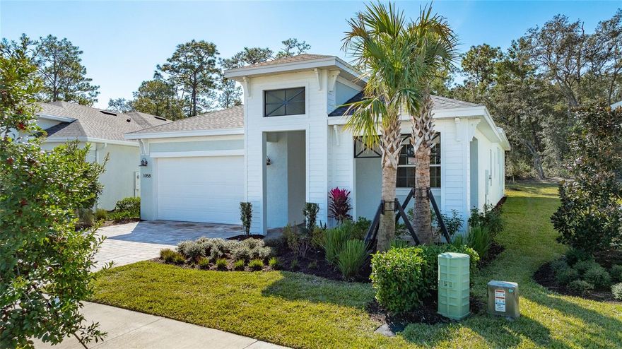 Discover Reserve at Victoria, a vibrant new home community in DeLand, Florida, just 10 minutes from downtown DeLand and Stetson University. This prime location offers easy access to Daytona Beach, New Smyrna Beach, and Orlando, plus a wealth of dining, shopping, and entertainment options nearby. Designed for an active lifestyle, the community features a resort-style pool, a modern fitness center, a welcoming clubhouse for social events, three pickleball courts, and a playground for families. Nature lovers will appreciate the nearby trails, preserves, parks, lakes, and natural springs, perfect for outdoor activities year-round. With energy-efficient, low-maintenance homes and a friendly neighborhood environment, Reserve at Victoria appeals to a wide range of buyers seeking quality living and convenience in Central Florida. Embrace the perfect blend of comfort, amenities, and location—find your new home at Reserve at Victoria today! This 3 Bedroom, 3.5 Bath home is located on a beautifully landscaped private homesite backing up to conservation, offering extra space between homes and added privacy. One of the only move in ready Madison models offering a second owners suite at The Reserve at Victoria. This home features a spacious main living area with 16' sliding doors leading to the Lanai. The interior boasts tray ceilings, and designer light fixtures. At the heart of the home is a kitchen that features quartz countertops, stainless steel appliances, and additional pot and pan drawers. Additional highlights include frameless shower enclosures and upgrade hexagon shower floor tile in both of the Owner’s Bath’s. This home also includes a Taexx pest control built-in system for added convenience. Schedule your tour today and connect with a Reserve at Victoria New Home Guide.