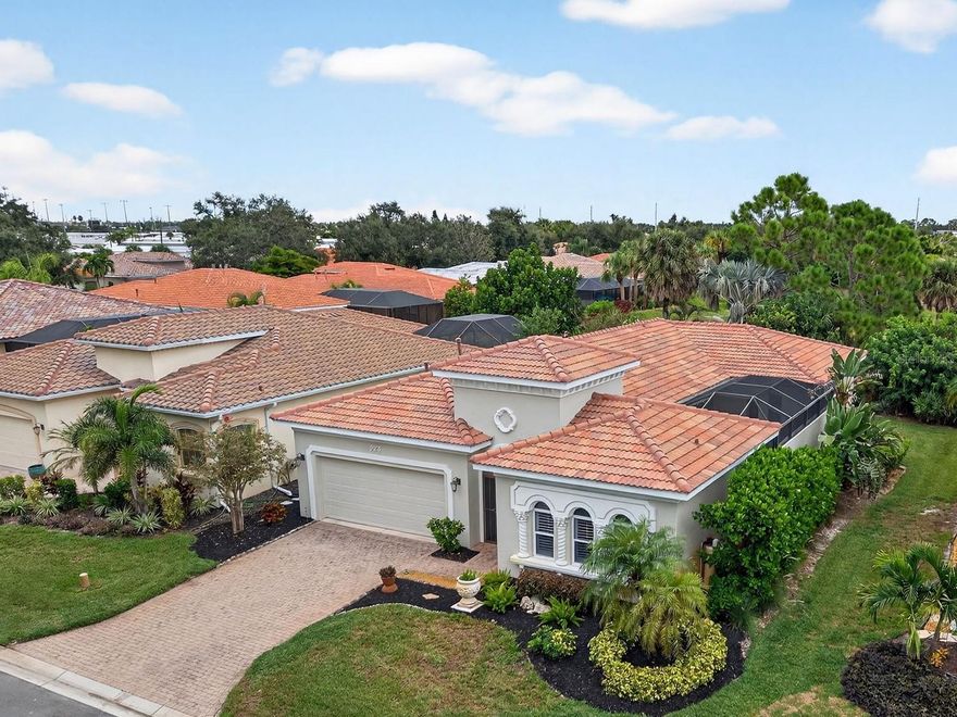 Venice Island Perfection: Private Courtyard Paradise with Casita in Bellagio! Unparalleled opportunity to live on Venice Island in Bellagio, one of Venice’s most desirable communities, perfect for year-round living or a seasonal escape. This gated community is in one of the highest elevations on Venice Island and the home is in the low-risk X flood zone, with no flood insurance required. Luxury, Low-Risk, & Ready for You! This home is a seamless blend of luxury and comfort, and recent renovations and upgrades have transformed it into a move-in-ready dream. Rest assured, it’s all systems go: the HVAC system was replaced in 2024 and the roof in 2023; a whole house water treatment system with reverse osmosis in the kitchen was added in 2024. Luxury vinyl plank (2024) enhances all 3 bedrooms. The pool was resurfaced and a new electric pool heater installed (2024). There’s even a new garage door motor with camera (2024).
The largest model in the community, the Trieste floor plan features 3 bedrooms, one of which is a unique, attached Casita with a separate entrance, perfect for guests or use as a private office or studio, complete with its own bathroom. The grand courtyard is an outdoor paradise offering total privacy and true Florida indoor-outdoor living with all rooms surrounding this focal space.
The main living space is centered around an open great room with fireplace and large picture window overlooking tropical landscaping. Upscale details like crown molding, plantation shutters and tray ceilings lend a premium feel.
A comfortable kitchen for cooking and entertaining includes stainless steel appliances, gas cook top with separate Microwave/convection oven and custom glass display cabinet doors as well as a handy, hanging pot rack.
Bellagio is a private, gated community of 142 single-family, maintenance-free Mediterranean-style homes, surrounded by mature trees and tropical landscapes. Resort-style amenities include tennis / pickleball courts, a sparkling pool, Clubhouse with fitness center and gathering spaces. Community roads have recently been repaved and gates upgraded and fortified. Bellagio residents enjoy direct access to the Venetian Waterway Park, which runs along the Intracoastal Waterway. Under 2 miles away in Historic Downtown Venice are endless options for boutique shopping, dining, festivals, Centennial Park’s concerts and gatherings, and Venice Theater! And several of our stunning Gulf Coast beaches are situated under 2 miles as well. This is currently the only home available in the community. Schedule an appointment to view this one in person to appreciate its unique details.
