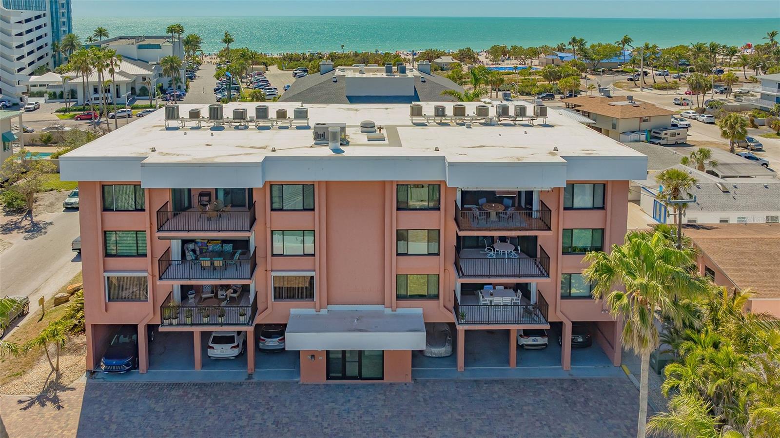 This bright and inviting 1,200 sq. ft. condo is perched on the top fourth floor of the Riviera of Lido Beach, a charming 14-unit complex just steps from the powdery sand of Lido Beach. Large windows fill the space with natural light, while the private terrace offers picturesque city views and stunning sunrises. The updated kitchen features stone countertops and a breakfast bar, perfect for casual dining or entertaining. Both bedrooms offer private full bath access, and the in-unit laundry room adds extra convenience.
The well-maintained complex includes a private pool, reserved parking with a storage closet, fenced grounds, and a generator for added peace of mind. Recent updates include hurricane rated windows and slider doors. Complex also has new entry doors.
Located just across the street from Lido Beach, this condo offers easy access to sun and surf, while a nearby public kayak launch provides the perfect spot for water adventures. St. Armands Circle, known for its vibrant mix of dining, shopping, and entertainment, is just a short walk away. Downtown Sarasota, with its renowned arts scene and waterfront charm, is only a quick drive, along with Sarasota-Bradenton International Airport for added travel convenience. Experience the best of Lido Key living.