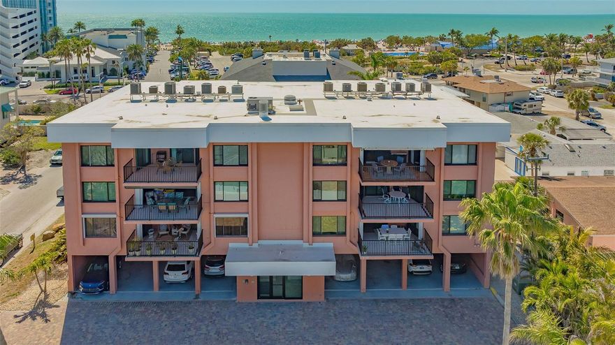 This bright and inviting 1,200 sq. ft. condo is perched on the top fourth floor of the Riviera of Lido Beach, a charming 14-unit complex just steps from the powdery sand of Lido Beach. Large windows fill the space with natural light, while the private terrace offers picturesque city views and stunning sunrises. The updated kitchen features stone countertops and a breakfast bar, perfect for casual dining or entertaining. Both bedrooms offer private full bath access, and the in-unit laundry room adds extra convenience.
The well-maintained complex includes a private pool, reserved parking with a storage closet, fenced grounds, and a generator for added peace of mind. Recent updates include hurricane rated windows and slider doors.  Complex also has new entry doors.  
Located just across the street from Lido Beach, this condo offers easy access to sun and surf, while a nearby public kayak launch provides the perfect spot for water adventures. St. Armands Circle, known for its vibrant mix of dining, shopping, and entertainment, is just a short walk away. Downtown Sarasota, with its renowned arts scene and waterfront charm, is only a quick drive, along with Sarasota-Bradenton International Airport for added travel convenience.  Experience the best of Lido Key living.