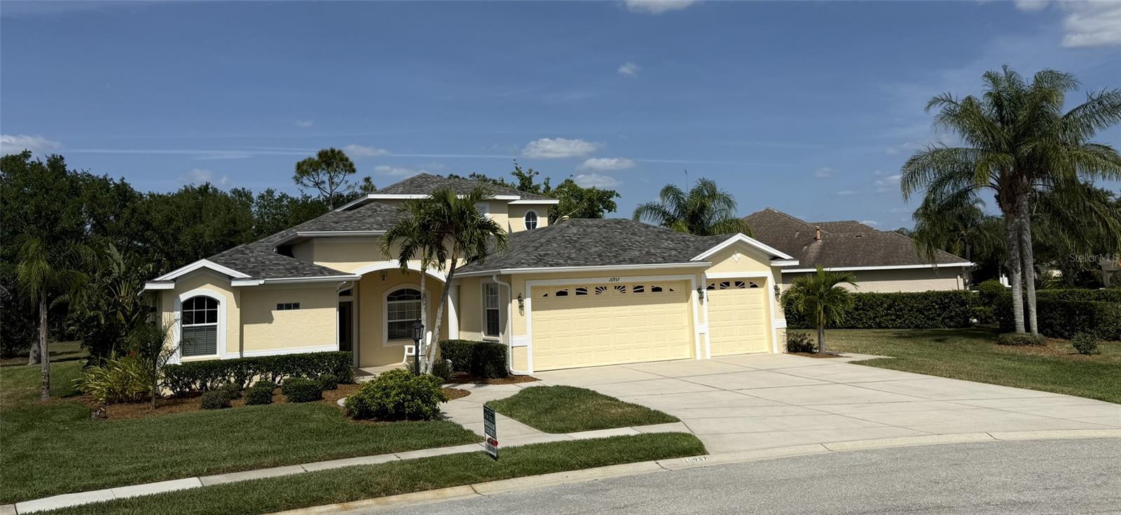 Lakewood Ranch, a Master Plan Community! Live the Florida lifestyle here at Riverwalk Meadow Village. In your new 5 bedroom split floor plan for privacy, this home has 3 full baths, many amenities, columns, crown moldings, plenty of storage, 3 car garage with an 8' high & 18' wide opening (great for storing your boat), large pie shaped lot, luscious landscaping, beautiful large social pool with planters for a lush feel includes benches, jets, waterfall, and removable mesh safety fence. There is a gas pipe line plumped to the lanai and pool area. WHAT'S NEW: Smart app with multi-use features for your cellular device: viewing, controlling, and monitoring features include a home security system, thermostat, garage door with keypad entry. New New roof 2020 and AC unit in 2019, 50 gallon water heater in 2017, garage utility door replaced with fiberglass casing & fiberglass wrapped solid door in 2023. Also, a new multi-speed pool motor in 2024 and pool skimmer replaced in 2025. Local schools are A-rated, many amazing parks, golf frisbee, golf courses, tennis courts, and pickleball. At the UTC mall, there is shopping with social event planning activities throughout the year, World Cup Rowing, Mote Marine-Noah's Ark Aquarium , fine dining, nearby hospital and doctors all within 5 to 10 minutes of this home. Nearby Siesta Key beach, one of the top 10 beaches in the world, and multiple other beaches close by. Join clubs and sporting teams available all around you to build your family memories in your new home.