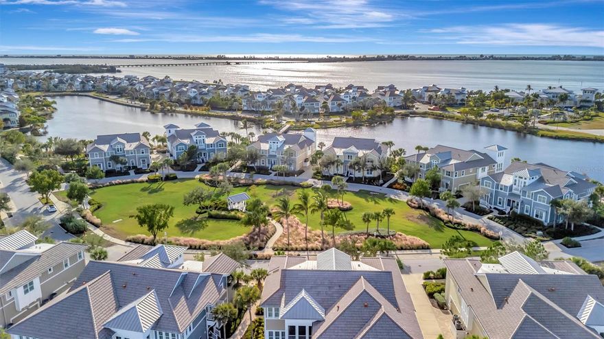Welcome to coastal luxury living at Harbour Isle on Anna Maria Sound! This immaculate and elevated coach home offers the perfect blend of elegance, comfort, and resort-style living—just moments from the world-renowned beaches of Anna Maria Island. Enjoy breathtaking southwest lagoon and nature views from the light-filled Florida room, ideal for colorful sunsets and serene water scenery. HVAC 2023!

Featuring 3 spacious bedrooms, 3 full baths, two en-suites, a huge kitchen island, plantation shutters, and a private in-home elevator, this beautifully designed residence lives like a single-family home with the convenience of low-maintenance living. The soaring vaulted great room enhances the open-concept layout, flowing into a gourmet kitchen complete with upgraded cabinetry, stone countertops, stainless-steel appliances, reverse osmosis system, and a generous dining area—perfect for entertaining or everyday gatherings. A Honeywell smart thermostat adds modern comfort and efficiency.

Located in the exclusive, gated, resort-style community of Harbour Isle, residents enjoy access to a private Beach Club with a waterfront Sky Bar, restaurant, and resort-style pool overlooking Anna Maria Sound. Additional world-class amenities include multiple pools throughout the community, a state-of-the-art fitness center, sauna, fire pits, grills, walking and biking trails, a kayak launch, and more.

Nature lovers will appreciate being just steps from Neal Preserve and only 2 miles from Robinson Preserve. Just outside the gates, you’ll find the Margaritaville-inspired Compass Hotel, Safe Harbour Marina with wet and dry storage, and the waterfront Floridays Tiki restaurant. Miles of scenic walking and biking paths wind throughout this beautiful gated community.

Come live the Harbour Isle lifestyle—coastal charm, luxury living, and unforgettable sunsets await!