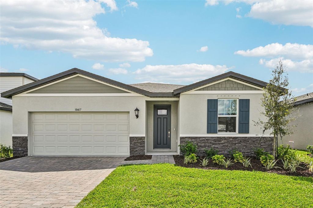 Photo of 10417 Abundance Grove Way, Parrish, FL 34219 (MLS # TB8478516)