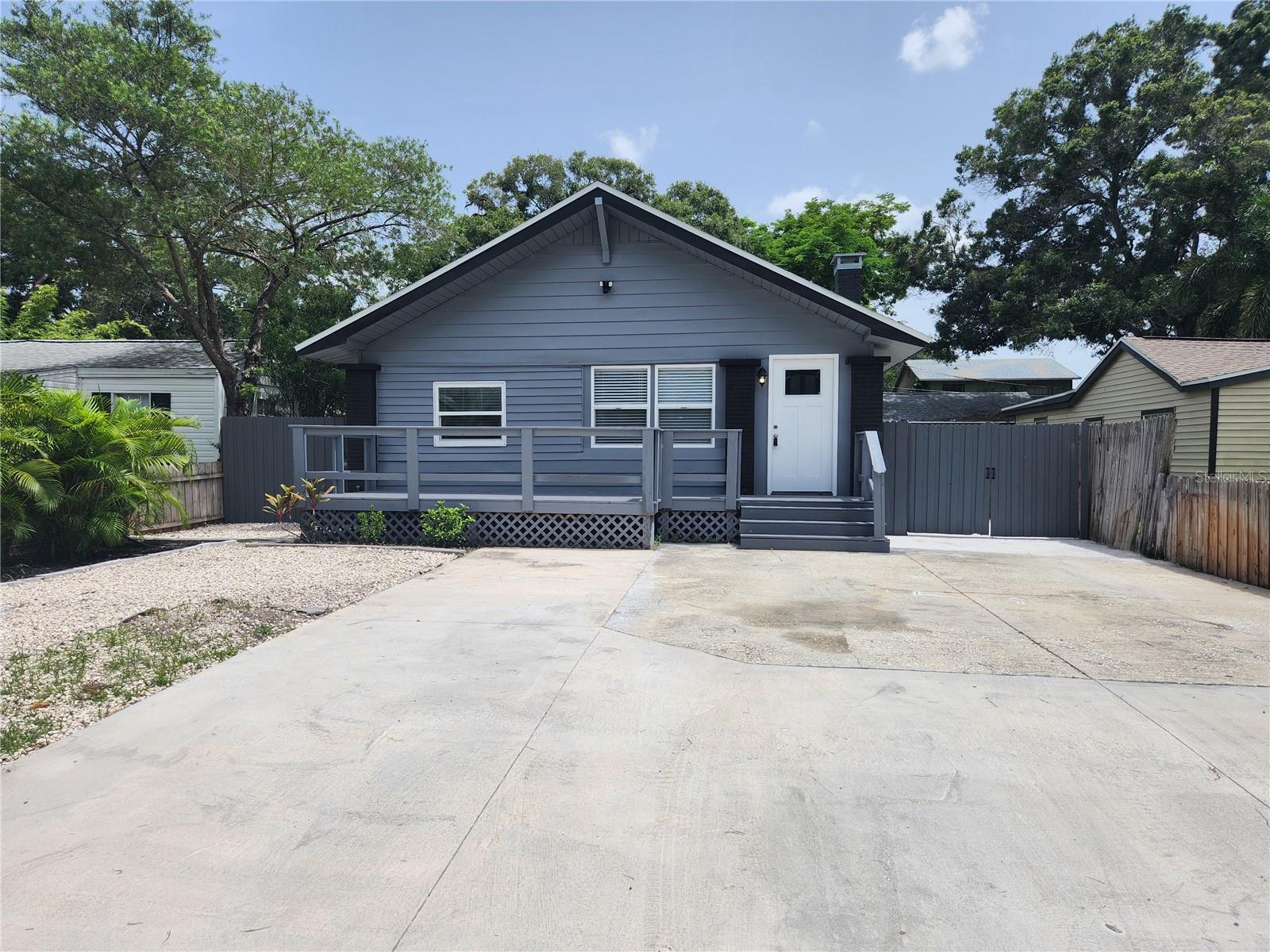 Welcome to this beautifully updated 3-bedroom, 2-bath home in the heart of St. Petersburg! Featuring an open floor plan, the oversized living room is perfect for entertaining. New GE Kitchen Appliances, Quartz Countertops, all New Kitchen Cabinets, Luxury Vinyl Flooring, Renovated Bathrooms with Mirror Lighting. Enjoy the privacy of a fenced-in yard, ideal for outdoor activities and relaxation. Modern finishes and abundant natural light make this home a true gem. Don't miss out on the opportunity to make it yours!