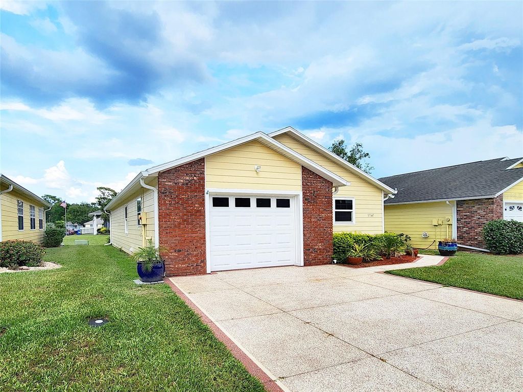 Photo of 37347 Derbyshire Drive, Zephyrhills, FL 33542 (MLS # TB8412846)
