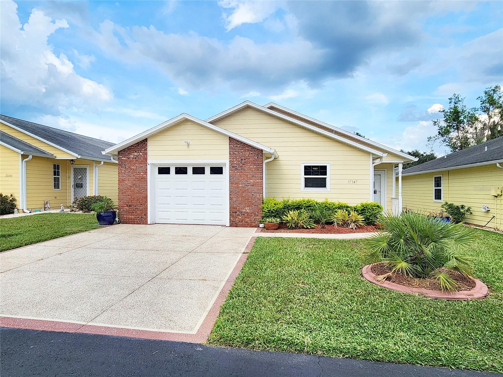 SELLER MOTIVATED! NEW 30-year ROOF and NEW HVAC installed in 2024 – move in with peace of mind to this well-maintained 2-bedroom, 2-bath home in the desirable 55+ community of Wedgewood Manor in Zephyrhills.
The spacious primary suite features a walk-in closet and a private en-suite bath. Enjoy cooking in the eat-in kitchen complete with a built-in desk, pantry, and ample cabinet space. The great room offers a bright, open layout with a formal dining area—perfect for entertaining or relaxing.
The home is filled with thoughtful upgrades, including beautiful oak flooring throughout (2017), new PGT windows (2019), and a fully remodeled den with new windows and door (2018). Additional improvements include extra attic insulation (2018), a GAF powered attic vent fan with new motor (2024), Rheem water heater (2018), and a widened and painted driveway to accommodate two cars (2018).
You'll also appreciate the new garage door (2018), slab door between kitchen and garage (2019), new laundry sink (2023), all-new Delta faucets, new blinds on every window (2017), and six wirelessly-interconnected smoke detectors (2018). The home has been freshly painted inside and out and is surrounded by ongoing professional landscaping. Outdoor features include vinyl post and rail on the front porch (2020), new storm doors in the front (2022) and back (2018), as well as gutters and downspouts (2017). Termite prevention treatment has been maintained annually since 2017, and pest treatments are done quarterly for both the house and yard.
All of this is nestled within a low-HOA community that covers ground maintenance, basic cable, internet, access to the community pool, shuffleboard, clubhouse with monthly activities, and recreational facilities.
Conveniently located near shopping, medical facilities, and golf courses—this one has it all!!!
Don't miss this opportunity—schedule your private showing today!