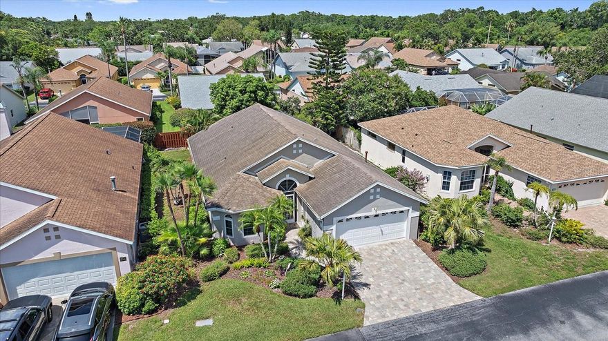 One or more photo(s) has been virtually staged. NEW ROOF INSTALLED BY DEC. 1. A Beautifully Maintained Home with 2 Bedrooms, Den, Lanai and Hot Tub!  Welcome to this immaculate 2 bedroom plus den, 2 bathroom, 2 car garage home nestled in the quiet, gated community of Village at Beekman—a hidden gem with low HOA fees and wonderful amenities. Step inside to an open and airy floor plan that seamlessly blends everyday comfort with entertaining ease. The spacious living areas flow into a large, covered lanai featuring a private hot tub—perfect for relaxing evenings or weekend gatherings. Wood fencing across the back adds an extra layer of privacy. Impact Windows ensuring safety and energy efficiency. You'll love the peace and quiet of this well maintained neighborhood, complete with a boutique-style pool, tennis and tranquil walking areas.  Located in a prime Sarasota location, you're just minutes from:  The stunning quartz sand beaches of Siesta Key and Lido Key. Vibrant Downtown Sarasota. The upscale UTC shopping district and fine dining options. Sarasota Bradenton International Airport. This home has been lovingly cared for and is move-in ready. Whether you're looking for a primary residence or a winter retreat, this property offers comfort, convenience and lifestyle.