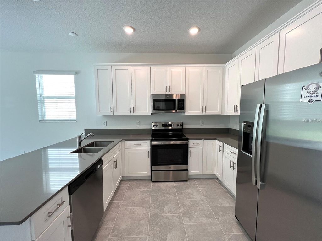 Photo of 7564 Stone Creek Trail, Kissimmee, FL 34747 (MLS # O6387174)