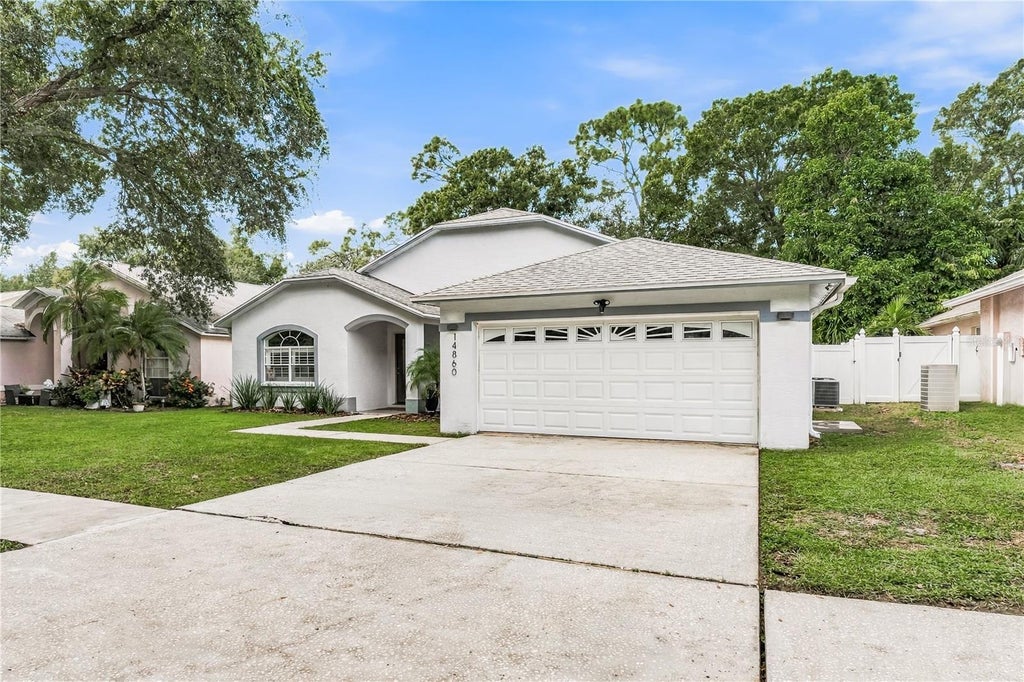 Photo of 14860 Sugar Cane Way, Clearwater, FL 33760 (MLS # TB8556136)
