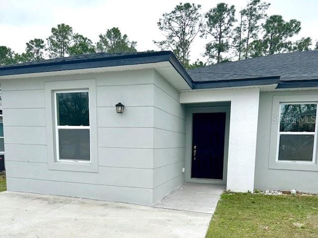 Photo of 528 Kilimanjaro Drive #A, Kissimmee, FL 34758 (MLS # O6387934)