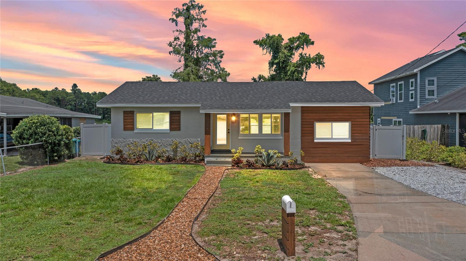 Welcome to your Lakefront Gem at Lake Lovely Estates! This fully remodeled 3 bedroom, 2 bathroom home on .54 acres is the epitome of modern lakefront living! Step directly into high-end finishes that elevate every corner of this privately fenced retreat. The newly updated kitchen dazzles with sleek quartz countertops, stainless steel appliances, and abundant cabinetry. Waterproof LVP flooring flows seamlessly throughout, complemented by custom bathroom tile, chic vanities, and stylish mirrors. This home is built for comfort and peace of mind, featuring newer (All 2022); double-pane hurricane-rated windows, roof, interior/exterior doors, water heater, plumbing, electrical , and Carrier HVAC, systems. Enjoy energy-efficient LED lighting and fans throughout. The in-house private laundry room doubles as a spacious storage area under air, complete with a newer washer/dryer for ultimate convenience. Step outside to your lakefront oasis, to soak up the Florida sunshine! A brand-new wood sun deck sets the stage for relaxation, while a custom 2-hole putting green with lush turf adds a playful touch! New Tremor Pavers lead to your very own white sand beach directly on the waters of Lake Hungerford. Whether you’re kayaking, canoeing, paddleboarding, or casting a line from your small fishing boat, this lakefront home offers plenty of adventurous times! The privately gated 6ft white vinyl fence ensures ultimate lake privacy, as well. Perfectly positioned with easy access to the Maitland Business Center between Lake Destiny Rd & Keller Rd, and just moments from the I-4 ramps, convenience meets tranquility. Don’t miss your chance to own this move-in-ready lakefront gem! Schedule your private showing today!