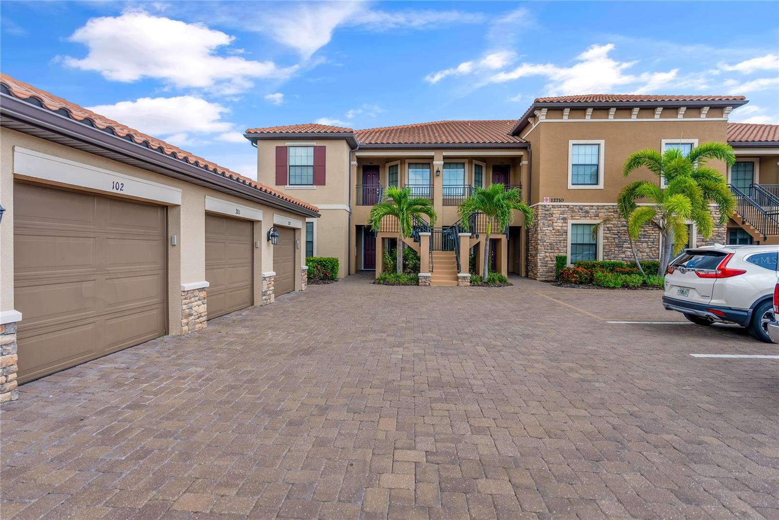 Welcome Home to Esplanade Golf & Country Club Lakewood Ranch, FL!!! This stunning 1st Floor End Unit Condo, backs up to the 10th hole on the community's renowned 18-hole championship golf course, recognized as one of the finest on the SunCoast.
Inside the immaculate “Turn-Key” home you’ll find a spacious 2 Bedrooms, 2 Full Bathrooms, and a versatile Flex Room that can be perfect as an Office, secondary Living Area, or a multitude of other functions. The home also has the benefits of a 1 Car Garage providing you additional storage.
The Kitchen is ready for all your cooking and meal prep needs with stainless steel appliances, granite countertops and ample cabinet space. The beautiful granite carries over into both Full Bathrooms adding an element of luxury. Dual Sinks and Dual Walk-In Closets within the Primary Bathroom/Bedroom provide both convenience and plenty of space! As an End Unit the home is bathed in natural sunlight, through the abundance of windows, creating a warm and inviting atmosphere, but when the need to be closer to nature arises you can step outside into your fully screened in Lanai to take in the fresh Florida air and sunshine.
The Esplanade Golf & Country Club is second to none… the ideal Lifestyle awaits with World Class amenities like the Barrel House Bistro Bar or the Bahama Bar, Championship Level Golf and Pro Shop, a multitude of Recreational Activities to include Pickleball and the Full Service Koquina Sand Spa. Many other communities attempt to emulate, but none are unable to duplicate! Don't miss this opportunity to live in and own your slice of paradise. Contact us for more information and to schedule your showing today!