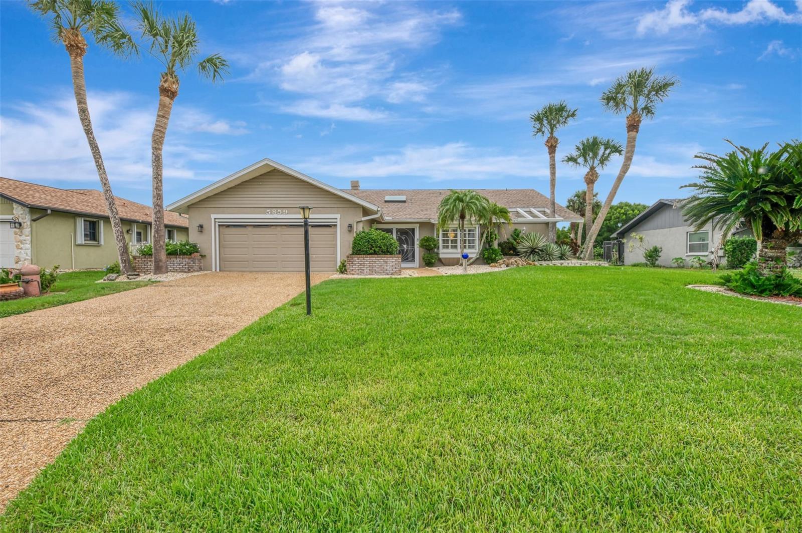 Opportunity is knocking! Don’t miss your chance to buy an updated custom 2-bedroom, 2-bath pool home on a quiet street in the sought-after Gulf View Estates, a “Hidden Gem” friendly, deed-restricted community with low HOA fees of only $325 annually and no CDD fees. Conveniently located just 5 minutes from Manasota Key Beach, this property is also conveniently located around the corner from the great shopping, dining, and entertainment in the Venice area - including the Atlanta Braves Spring Training complex.
As you step inside through the double-door entry and screened porch, you'll be welcomed by abundant natural light, soaring vaulted ceilings, and the popular Open Floor plan. This design flows seamlessly from the Great Room into the Dining Room and into the Chef's Kitchen, which has been completely updated with beautiful wood cabinets, expansive granite countertops, modern appliances, and a cozy breakfast nook, which features a convenient disappearing door to the Lanai.
The Great Room features a fireplace and French doors that open to the oversized lanai and a sparkling heated pool. The lanai provides ample space to relax and enjoy the Florida outdoor lifestyle, including a wet bar/Jenn-Aire cooking feature, an extendable sun shade, plus room for a free-standing fire pit.
Retreat to the Owner's Suite, which boasts vaulted ceilings, French doors leading to the lanai, an oversized walk-in closet, and a fully renovated en-suite bath. The en-suite bath includes designer upgrades such as a lovely raised vanity and an expansive zero-entry step walk-in shower.
The second bedroom, updated second bath and linen closet are located on the opposite side of the home for added privacy, making it a perfect in-law suite or second owner's suite. The fully equipped laundry room, complete with cabinets and a laundry tub, is conveniently located next to the 2-car garage. An outdoor shower provides a quick rinse from the Beach. This home has been re-plumbed, has an updated electric panel, a new HVAC system installed in 2020, and a new roof installed in 2021. Generator on site and some furniture is negotiable.
This well-maintained home is move-in ready!