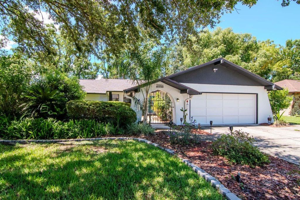 Photo of 23924 Forest Place, Land O Lakes, FL 34639 (MLS # TB8399169)