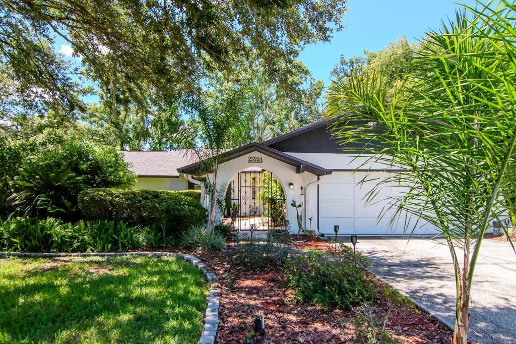 Photo of 23924 Forest Place, Land O Lakes, FL 34639 (MLS # TB8399169)