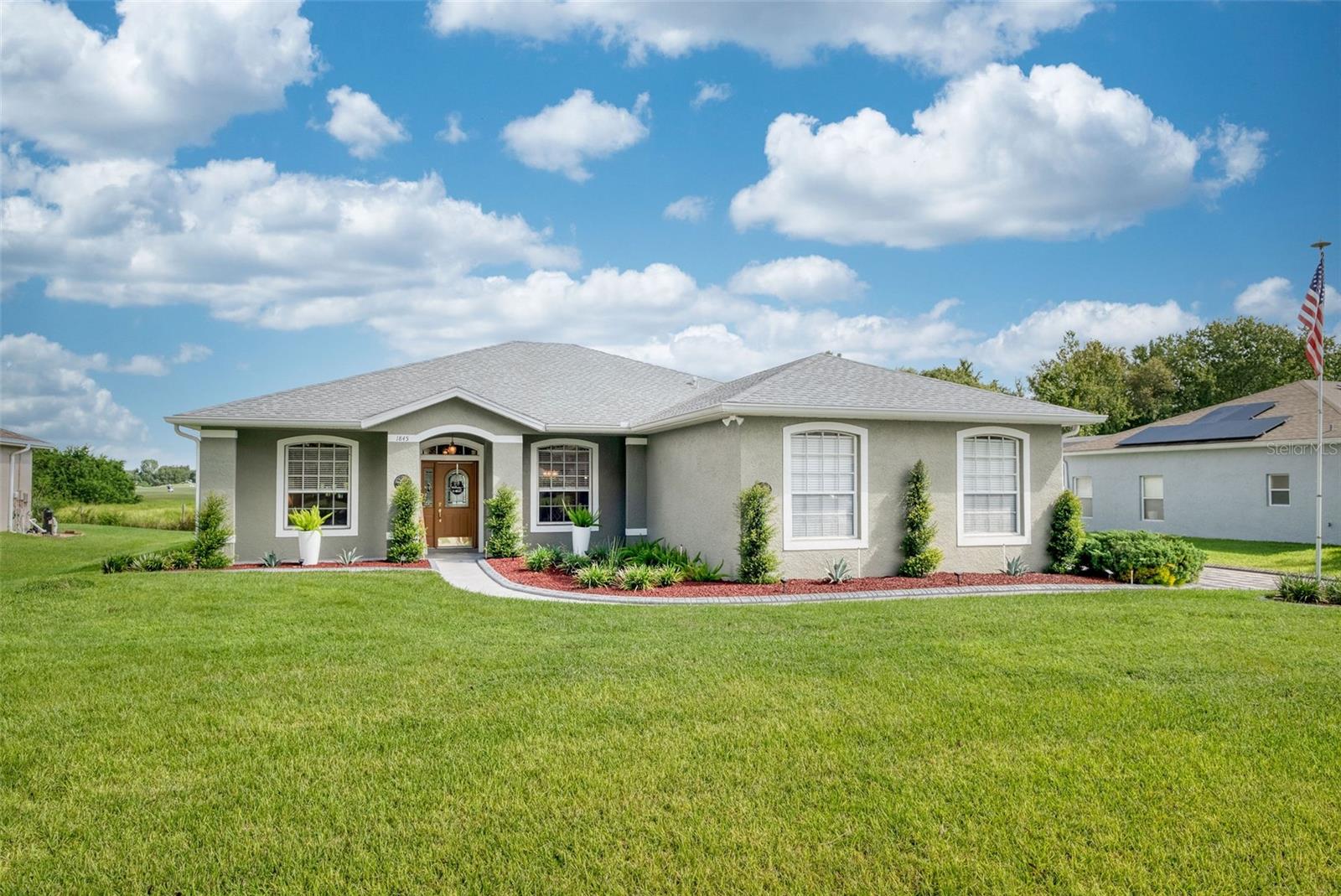 Welcome to Resort-Style Living!
This beautifully maintained 4-bedroom, 2-bath home is tucked inside a well maintained gated golf course community, offering the perfect blend of comfort, privacy and luxury. Step inside to an open, light-filled floor plan featuring spacious living and dining areas, a well-appointed kitchen, and serene views of the fairway. The primary suite boasts a private retreat with a walk-in closet and spa-like bath, while three additional bedrooms provide space for family, guests, or a home office. Outdoors, enjoy your own personal oasis — a sparkling pool and spa with screened lanai, ideal for relaxing or entertaining while overlooking the lush golf course. All major components have been updated; roof 2020, HVAC 2025, septic 2020, water heater 2016, pool pump 2024 and much more (see feature sheet for complete list). Located in a sought-after community with secure gated entry, this home offers the lifestyle you’ve been waiting for.