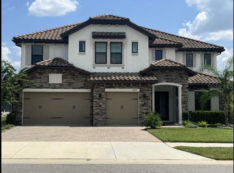 Photo of 6129 Marsh Trail Drive, Odessa, FL 33556 (MLS # TB8504052)