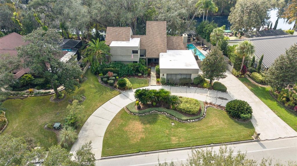 Photo of 1221 N Riverhills Drive, Temple Terrace, FL 33617 (MLS # TB8449712)