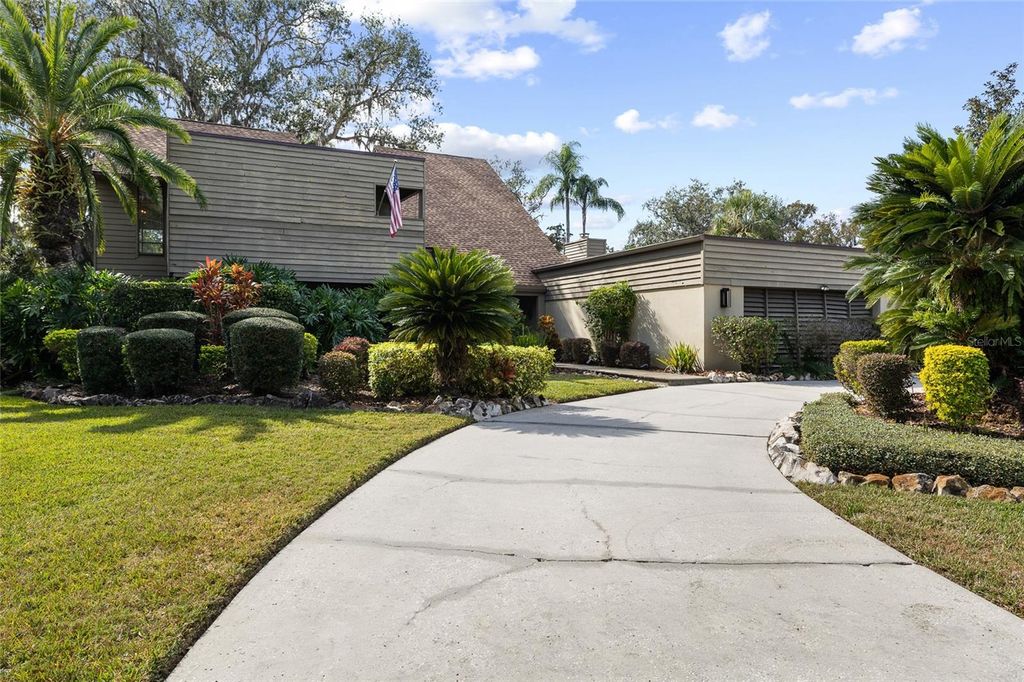 Photo of 1221 N Riverhills Drive, Temple Terrace, FL 33617 (MLS # TB8449712)