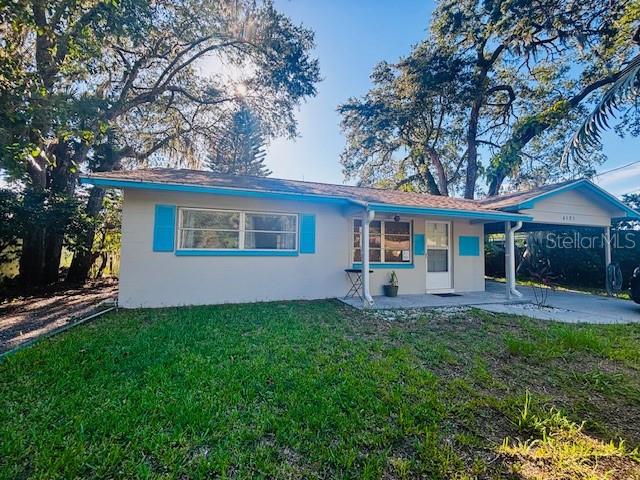 WEEKI WACHEE !!! Concrete Block UP RIVER / Wide Canal !!! This Well Maintained 2 Bed, 2 Bath, 1 Car Garage Home Has an Amazing 65 FOOT SEAWALL !!! Complete With a Floating Dock, Fish Cleaning Station and Outdoor Shed. This Wide Canal Can Accommodate Pontoon Boats and Many Other Size/ Style Boats. Brand New Kitchen and Terrazzo Flooring Throughout !!! The Original Hall Bath Is In Pristine Condition With Its Nautical Blue Trimmed Tile Walls, Sink and Bathtub !! Newer A/C System And a HUGE 4 Season Florida Room. Live Here Year Round or Use as a Vacation Rental. This Oversized Lot Has Room For Boat Trailer Parking and Also has a Covered Carport. This Property Would Make A Fantastic Vacation Rental Home !! Whatever Your "RIVER DREAMS" Are This Is The Place !!